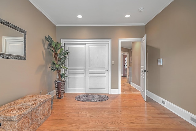 351 Monroe Pvt Dr, Bristol, TN 37620 - entryway with ornamental molding, light wood finished floors, and recessed lighting