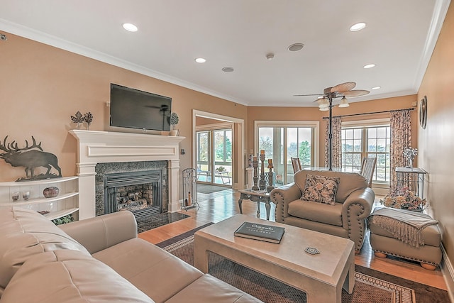 351 Monroe Pvt Dr, Bristol, TN 37620 - living area with wood finished floors, ornamental molding, a high end fireplace, recessed lighting, and a ceiling fan
