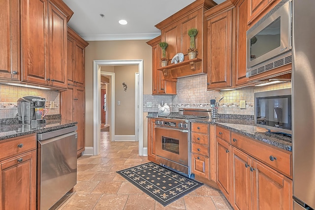351 Monroe Pvt Dr, Bristol, TN 37620 - kitchen with stainless steel appliances, crown molding, brown cabinets, tasteful backsplash, and dark stone counters