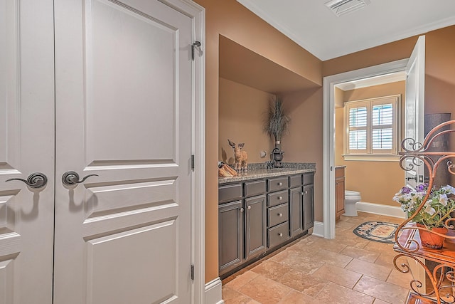 351 Monroe Pvt Dr, Bristol, TN 37620 - bathroom with double vanity and stone tile floors