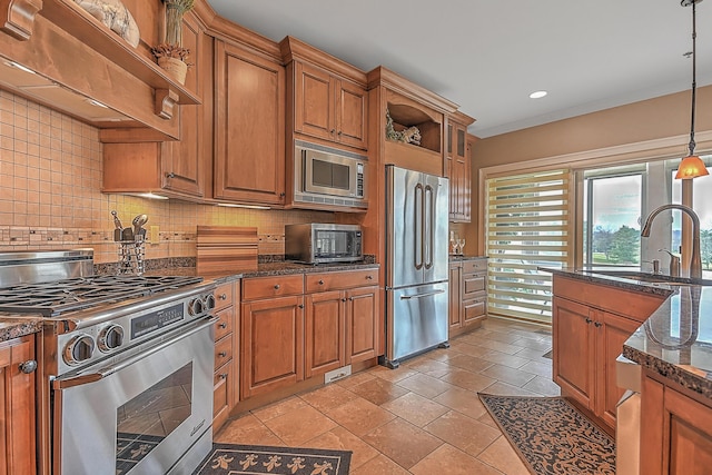351 Monroe Pvt Dr, Bristol, TN 37620 - kitchen with appliances with stainless steel finishes, open shelves, brown cabinetry, decorative backsplash, and custom exhaust hood