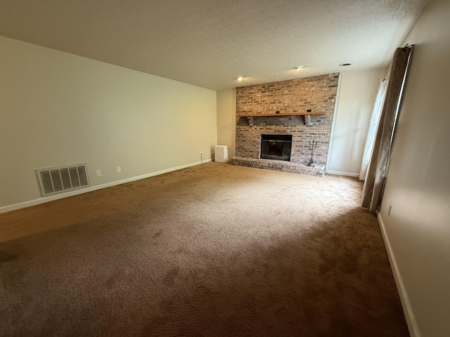 968 Cedar Trace Ln, Morristown, TN 37814 - unfurnished living room with carpet, a brick fireplace, baseboards, and a textured ceiling