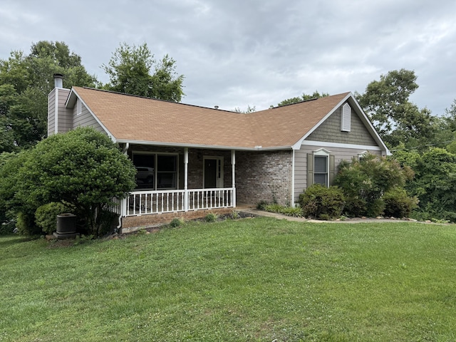 968 Cedar Trace Ln, Morristown, TN 37814 - ranch-style home with a porch, a front lawn, a chimney, brick siding, and roof with shingles