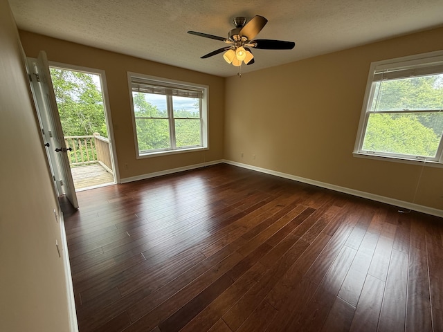 968 Cedar Trace Ln, Morristown, TN 37814 - empty room featuring healthy amount of natural light, baseboards, ceiling fan, dark wood-style floors, and a textured ceiling