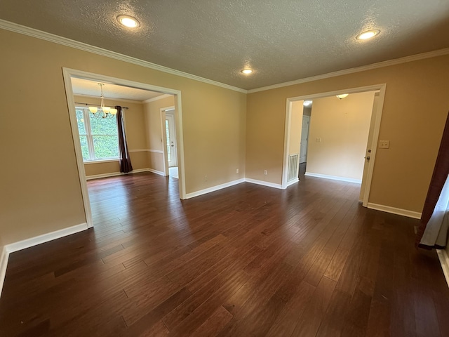968 Cedar Trace Ln, Morristown, TN 37814 - unfurnished room featuring a textured ceiling, a chandelier, dark wood finished floors, baseboards, and ornamental molding