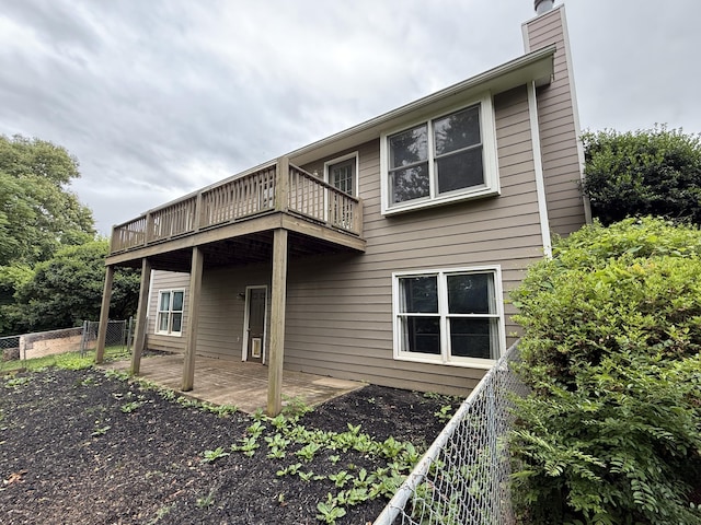 968 Cedar Trace Ln, Morristown, TN 37814 - rear view of house with a chimney, a patio, and a balcony