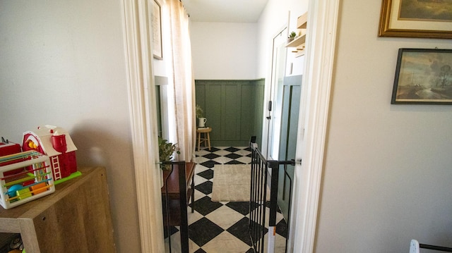 hall featuring tile patterned floors