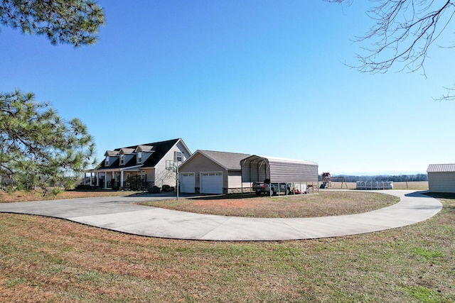1096 Ch Rankin Rd, White Pine, TN 37890 - view of front of house featuring a garage, a front lawn, and driveway