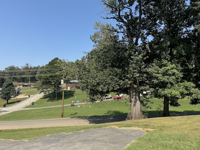 surrounding community featuring a lawn