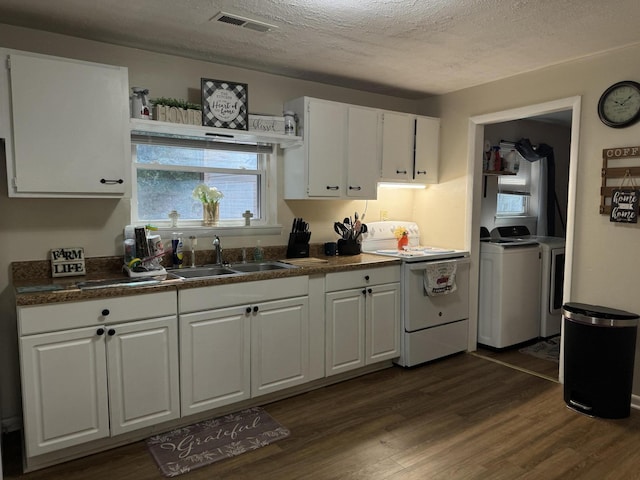 kitchen with dark wood-type flooring, range, sink, a textured ceiling, and white cabinetry