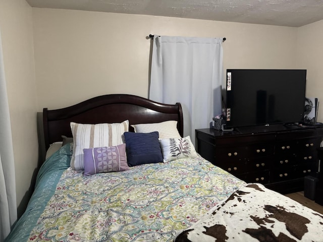 bedroom with a textured ceiling