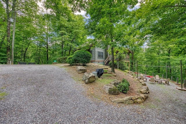 view of front facade featuring a fire pit