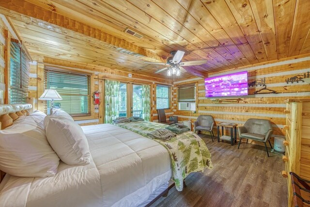 bedroom with wooden ceiling, wood finished floors, french doors, access to exterior, and wood walls