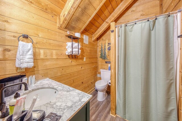 full bathroom featuring wood ceiling, lofted ceiling, toilet, wood walls, and wood finished floors