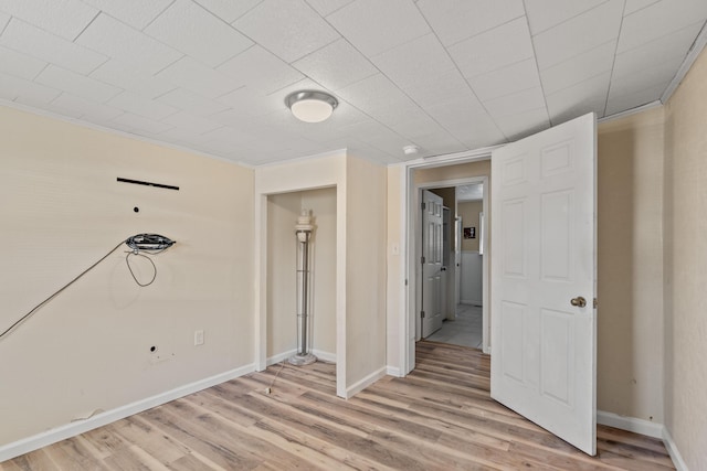 spare room featuring light hardwood / wood-style floors