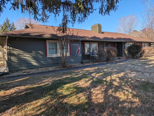 ranch-style house with a front yard