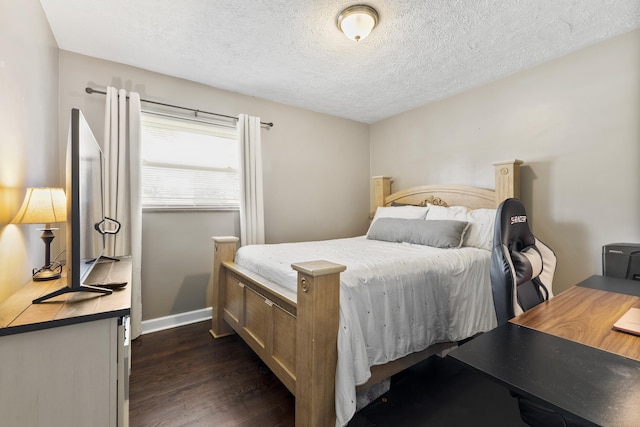 2121 Fir St, Morristown, TN 37813 - bedroom with dark wood-type flooring and a textured ceiling