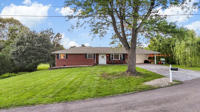 2121 Fir St, Morristown, TN 37813 - ranch-style home with driveway, brick siding, a front lawn, and a carport