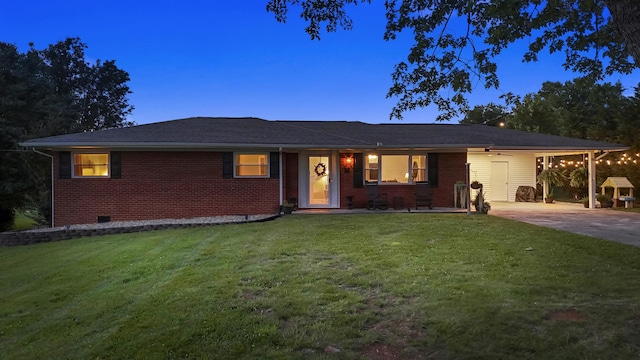 2121 Fir St, Morristown, TN 37813 - ranch-style home with concrete driveway, brick siding, a front lawn, and a carport