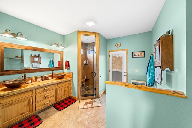 2760 Forest Ridge Rd, Dandridge, TN 37725 - full bath featuring a stall shower, double vanity, tile patterned flooring, and baseboards