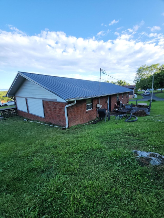 204 Clearview Dr, Bean Station, TN 37708 - view of property exterior featuring brick siding, a lawn, and metal roof