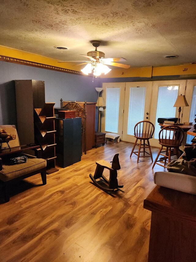 204 Clearview Dr, Bean Station, TN 37708 - living area featuring a ceiling fan, a textured ceiling, and wood finished floors