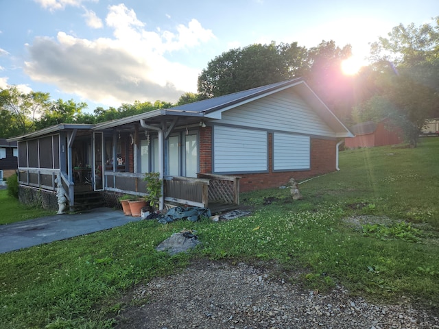 204 Clearview Dr, Bean Station, TN 37708 - view of front of house with a front lawn, brick siding, and covered porch