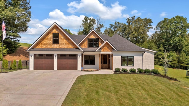 craftsman-style house with a front yard and a garage