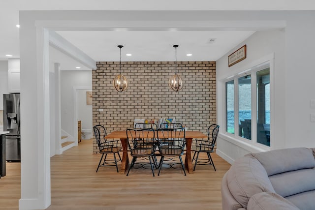 1936 Turners Landing Rd, Russellville, TN 37860 - dining space featuring light hardwood / wood-style flooring and brick wall