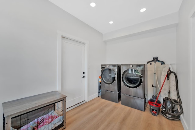 1936 Turners Landing Rd, Russellville, TN 37860 - laundry room featuring washing machine and dryer and light wood-type flooring