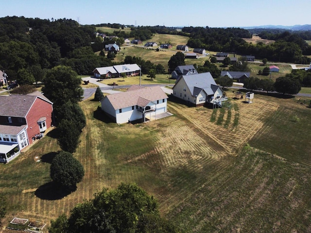 birds eye view of property featuring a rural view
