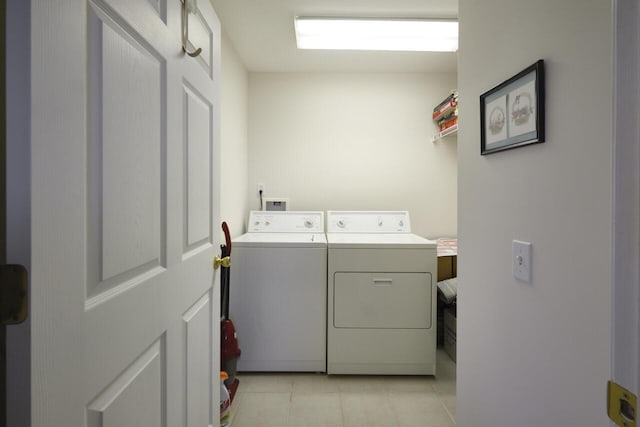 laundry area with washer and clothes dryer