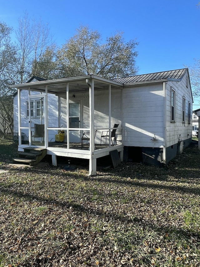 exterior space with a sunroom