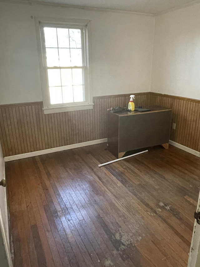 spare room featuring dark hardwood / wood-style floors