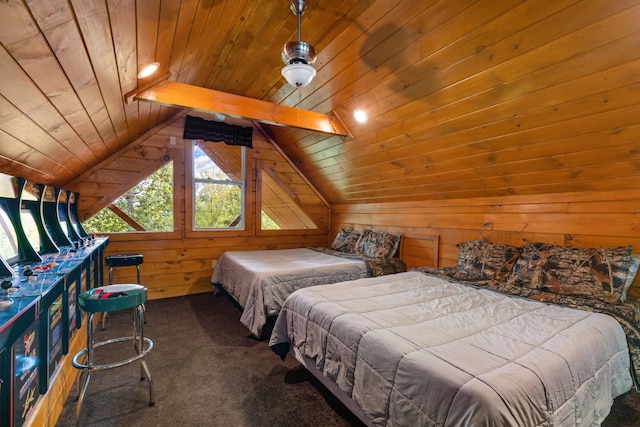 bedroom featuring lofted ceiling with beams, wood walls, wood ceiling, and dark carpet