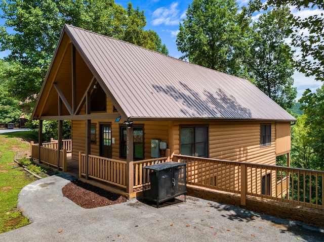 back of house with a porch