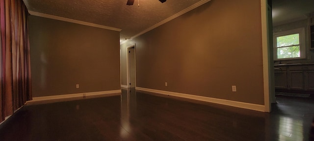 1034 E Skyline Dr, Morristown, TN 37813 - spare room with dark wood finished floors, ceiling fan, a textured ceiling, and crown molding