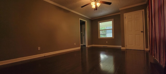 1034 E Skyline Dr, Morristown, TN 37813 - spare room with dark wood-style flooring, a ceiling fan, a textured ceiling, and ornamental molding