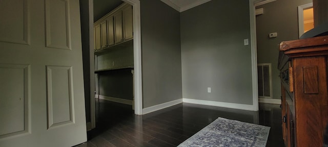 1034 E Skyline Dr, Morristown, TN 37813 - unfurnished bedroom with dark wood-style floors and ornamental molding