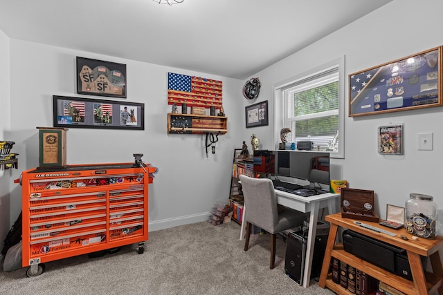 carpeted office with baseboards
