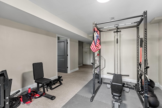workout area featuring visible vents and baseboards