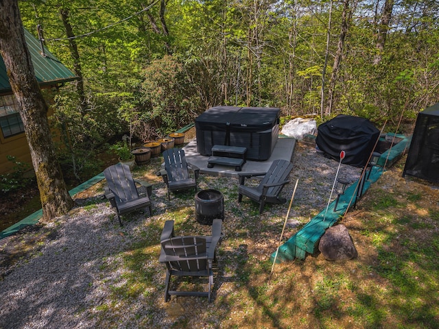 5014 Latta Way, Gatlinburg, TN 37738 - view of yard featuring a wooded view and a hot tub