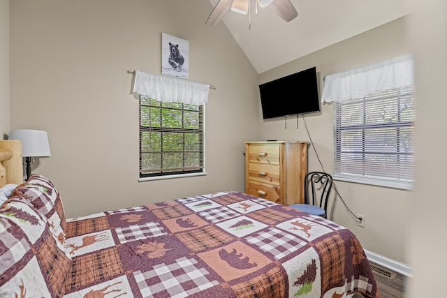 5014 Latta Way, Gatlinburg, TN 37738 - bedroom featuring multiple windows, vaulted ceiling, baseboards, and a ceiling fan