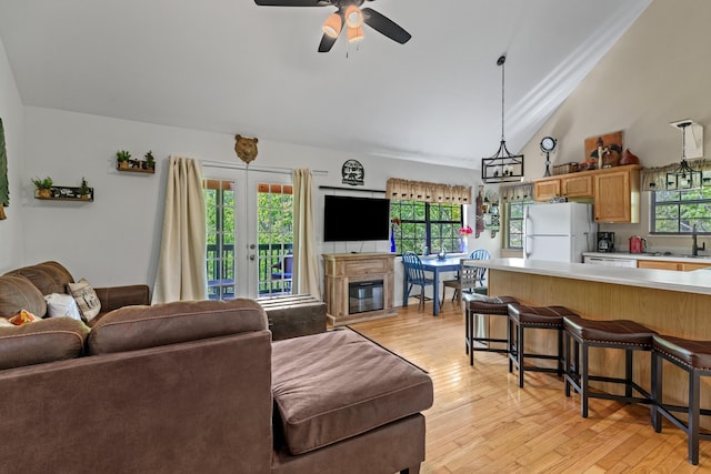 5014 Latta Way, Gatlinburg, TN 37738 - living area featuring light wood finished floors, a ceiling fan, and lofted ceiling