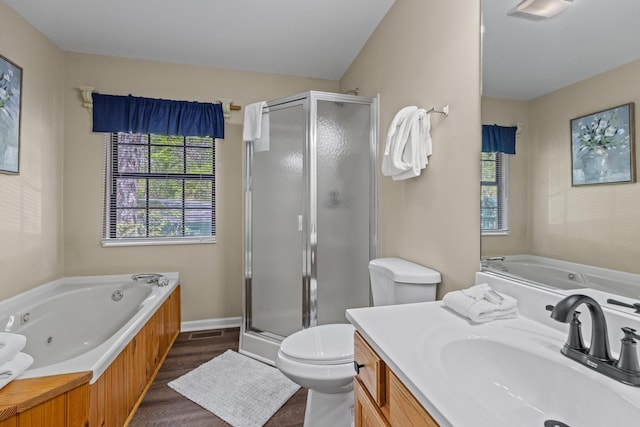 5014 Latta Way, Gatlinburg, TN 37738 - full bathroom with a stall shower, toilet, a whirlpool tub, and wood finished floors