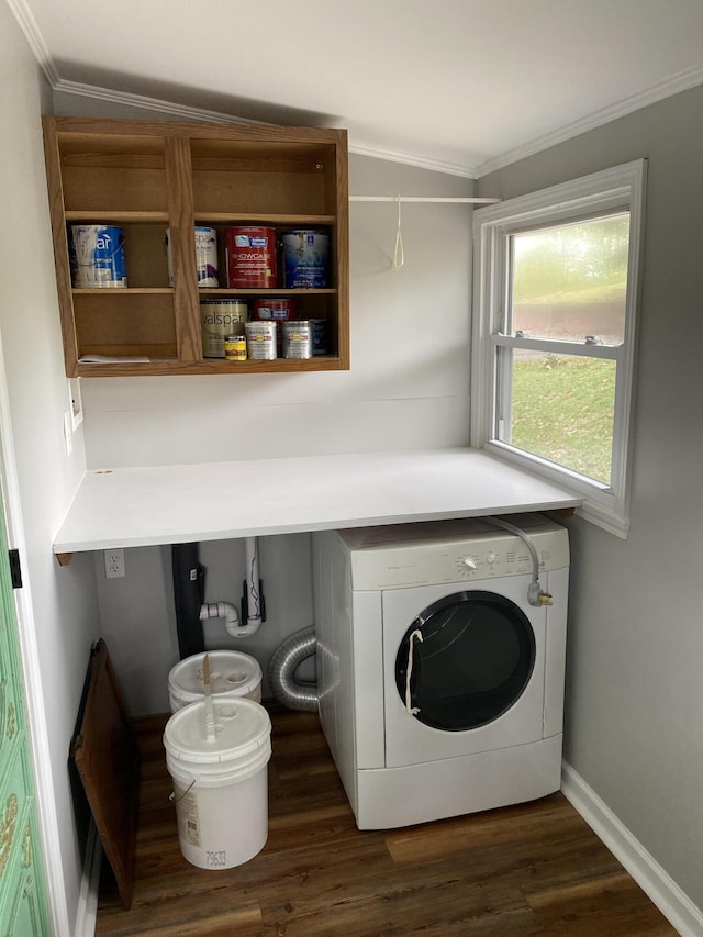 laundry room with washer / clothes dryer, crown molding, and dark hardwood / wood-style floors