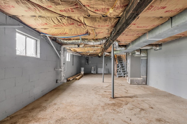 basement featuring heating unit