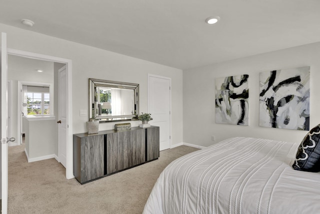 bedroom with recessed lighting, carpet flooring, and baseboards