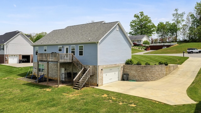 rear view of house featuring driveway, brick siding, a wooden deck, an attached garage, and stairway