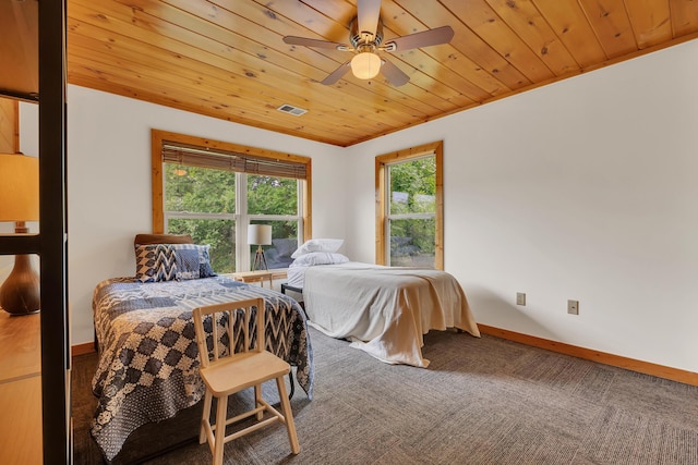 3466 Caywood Rd, Dandridge, TN 37725 - carpeted bedroom with baseboards, wood ceiling, and a ceiling fan